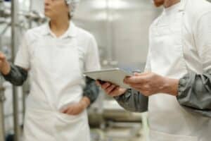 Inspecting Food Processing Machinery In Factory